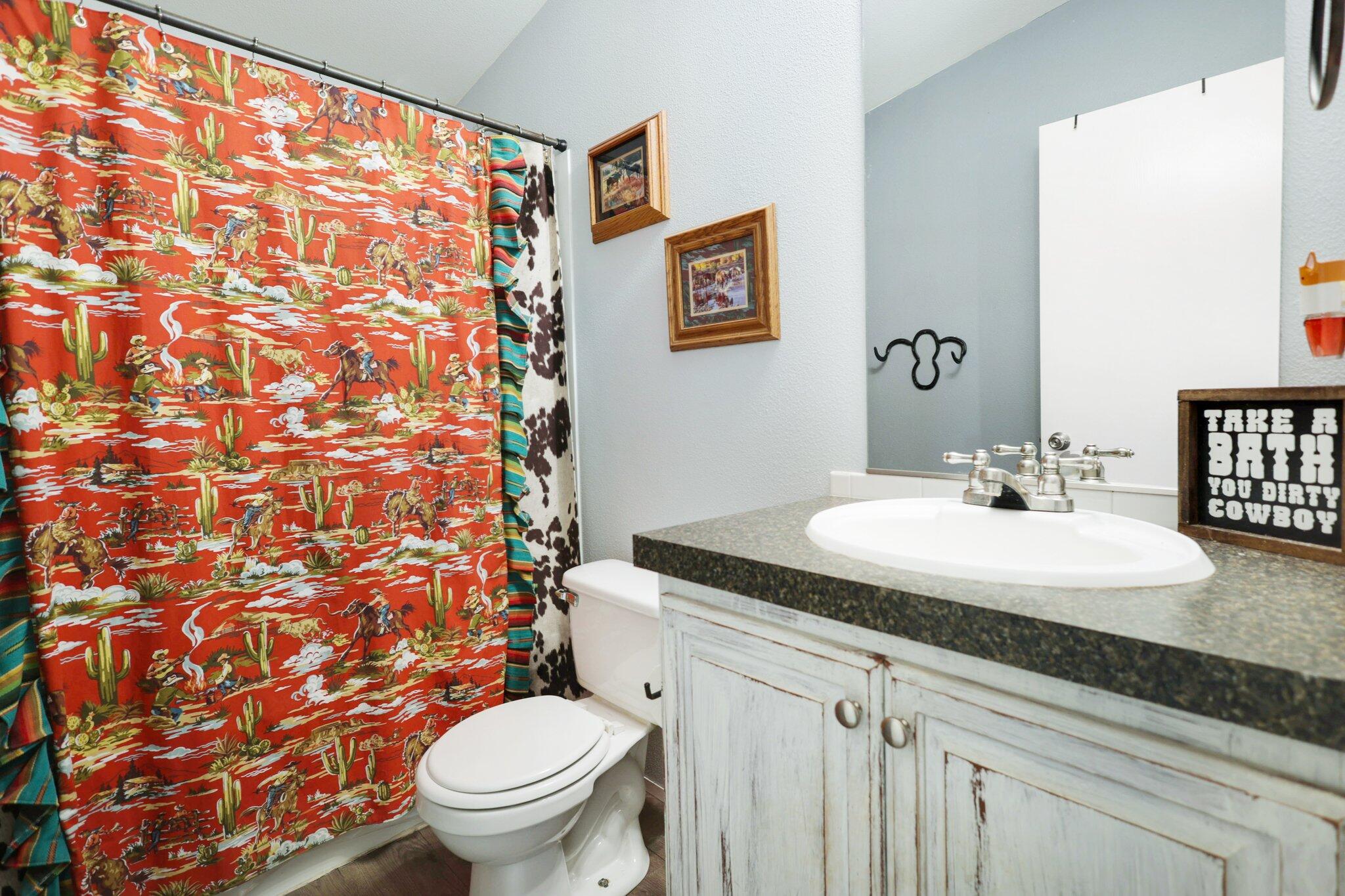 5078 Balls Ferry Road Anderson, CA 96007 - Photo 71 of 113 a bathroom with a granite countertop sink and a mirror with toilet
