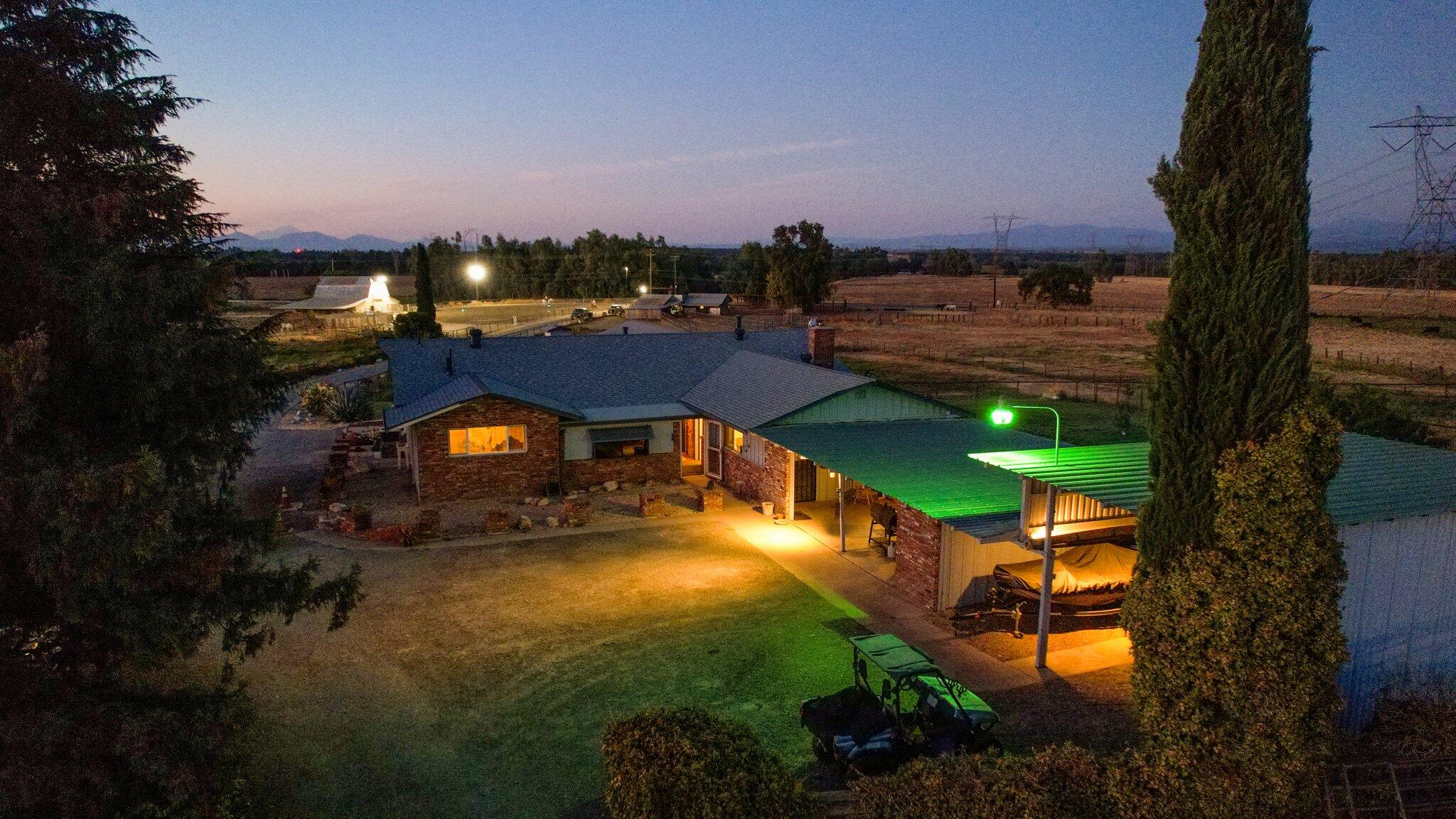 5078 Balls Ferry Road Anderson, CA 96007 - Photo 100 of 113 a view of a garden with a building in the background