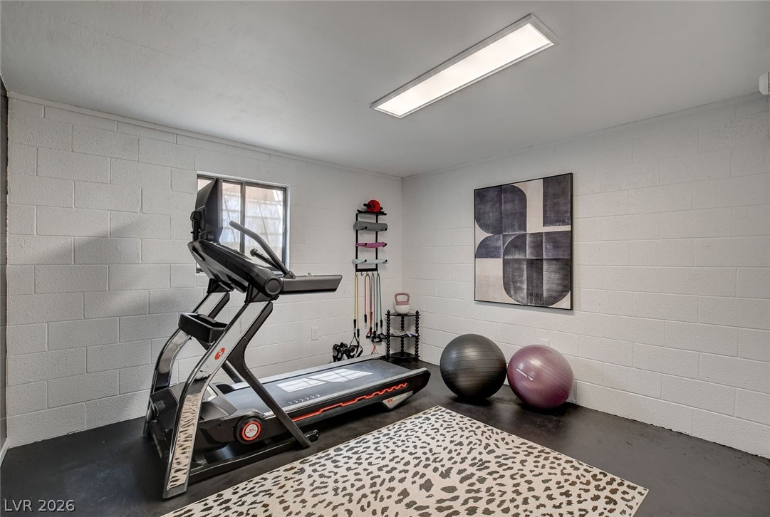 3765 Berkeley Street Logandale, NV 89021 - Photo 61 of 87 This currently dedicated fitness space offers convenience for your daily workout routine or use as a bedroom.