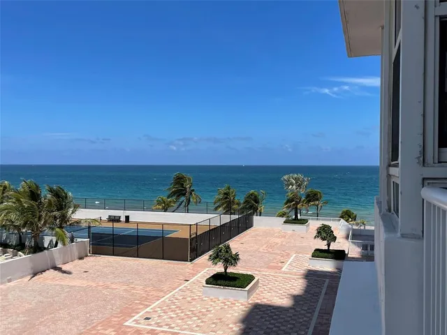 a terrace view with sitting space and garden view