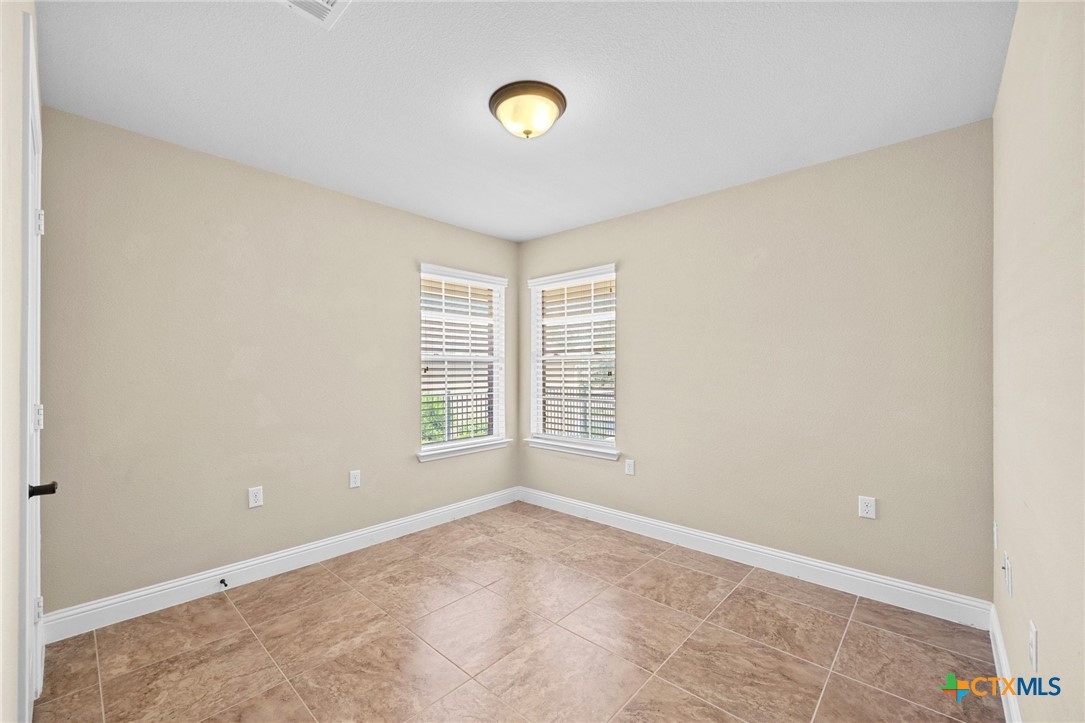 309 Kickapoo Creek Lane Georgetown, TX 78633 - Photo 20 of 28 a view of an empty room with a window