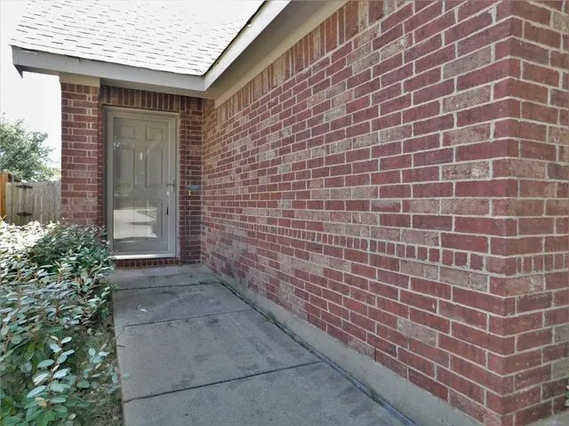 a view of a brick wall