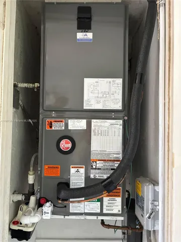 a bathroom with a sink a toilet and a shower