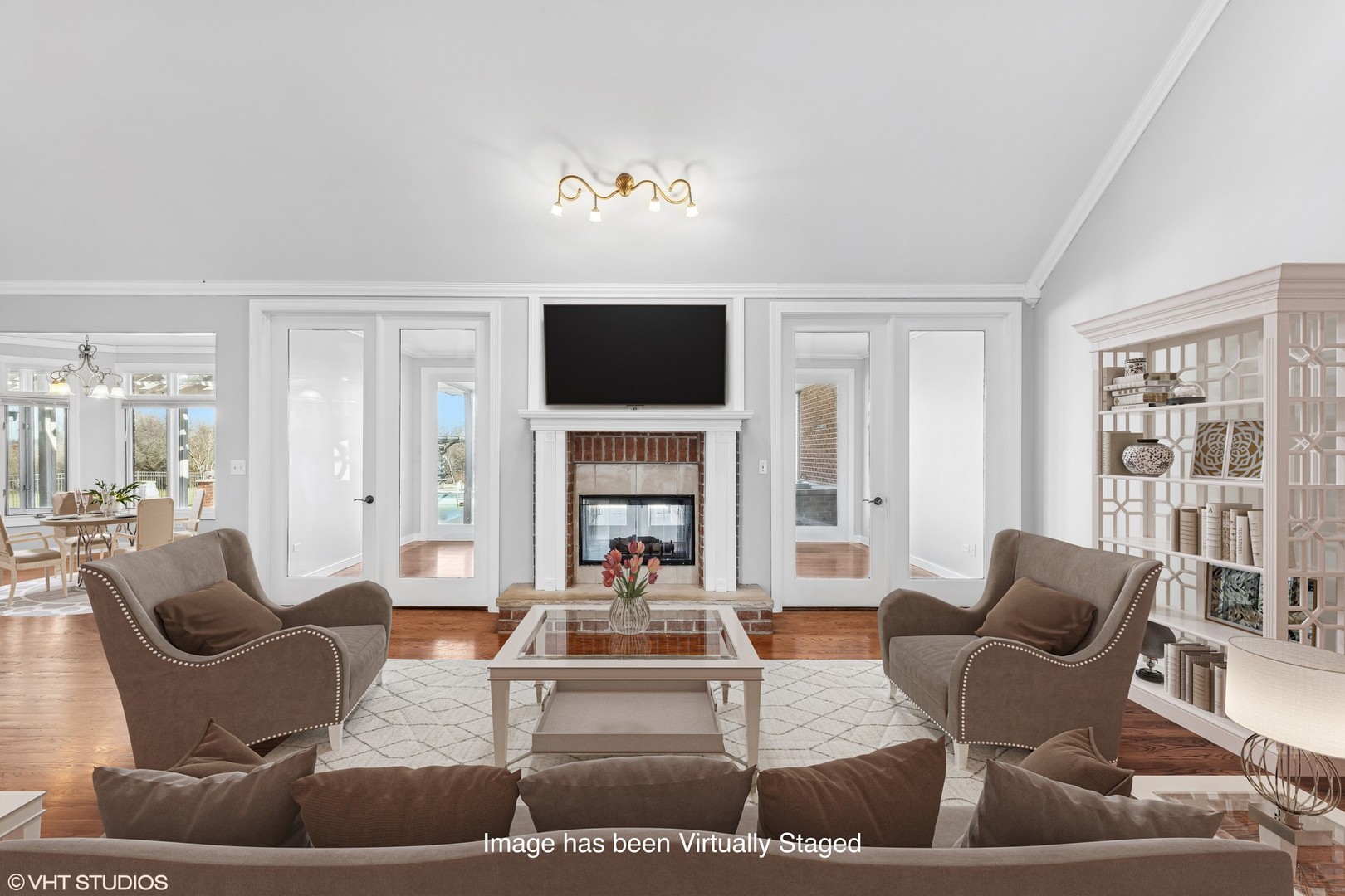 26711 South Anna Lane Monee, IL 60449 - Photo 11 of 43 a living room with furniture a fireplace and a flat screen tv