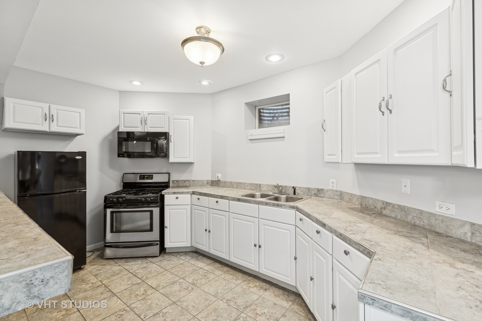 26711 South Anna Lane Monee, IL 60449 - Photo 40 of 43 a kitchen with stainless steel appliances granite countertop a stove a sink and a refrigerator