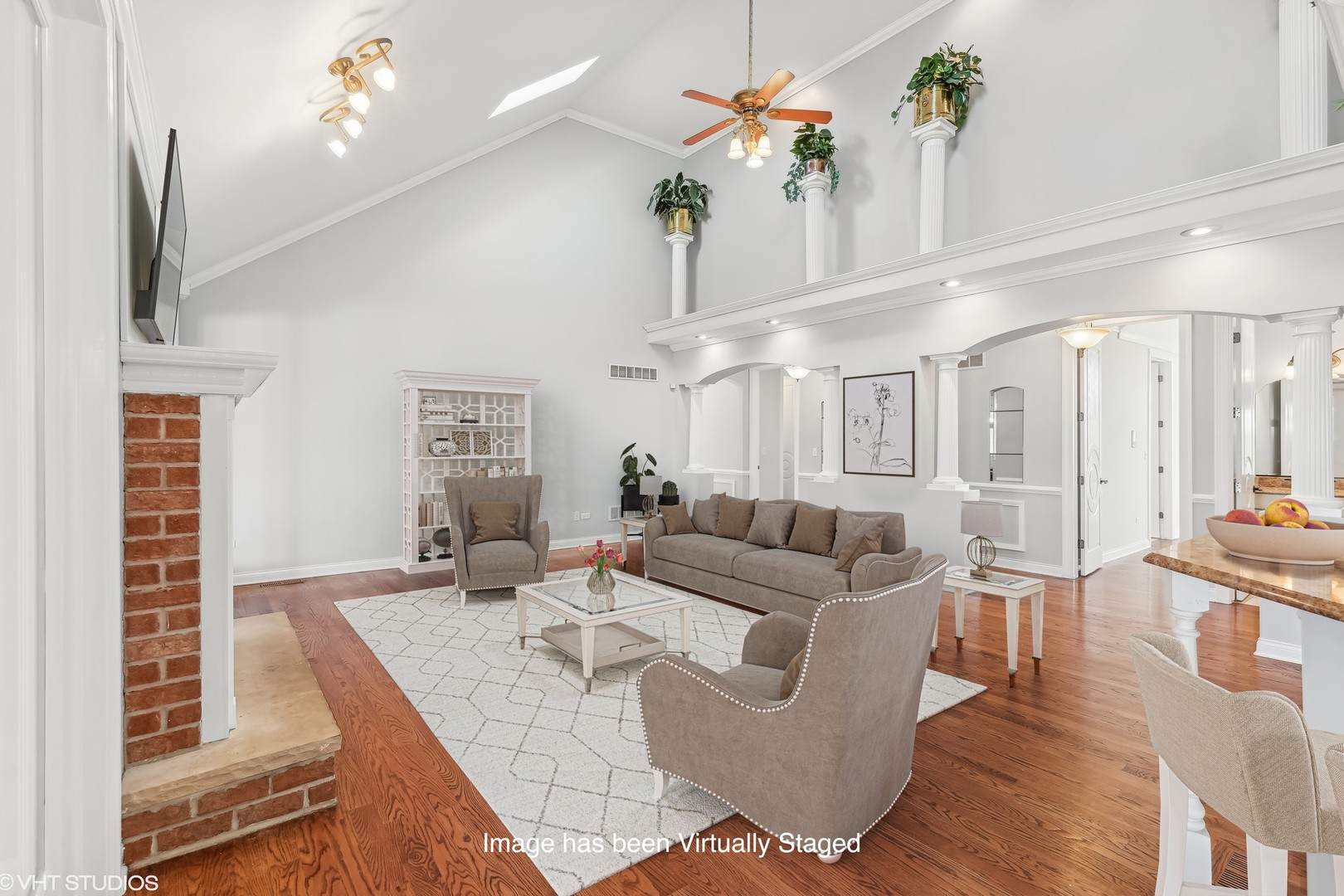 26711 South Anna Lane Monee, IL 60449 - Photo 10 of 43 a living room with furniture kitchen view and a chandelier