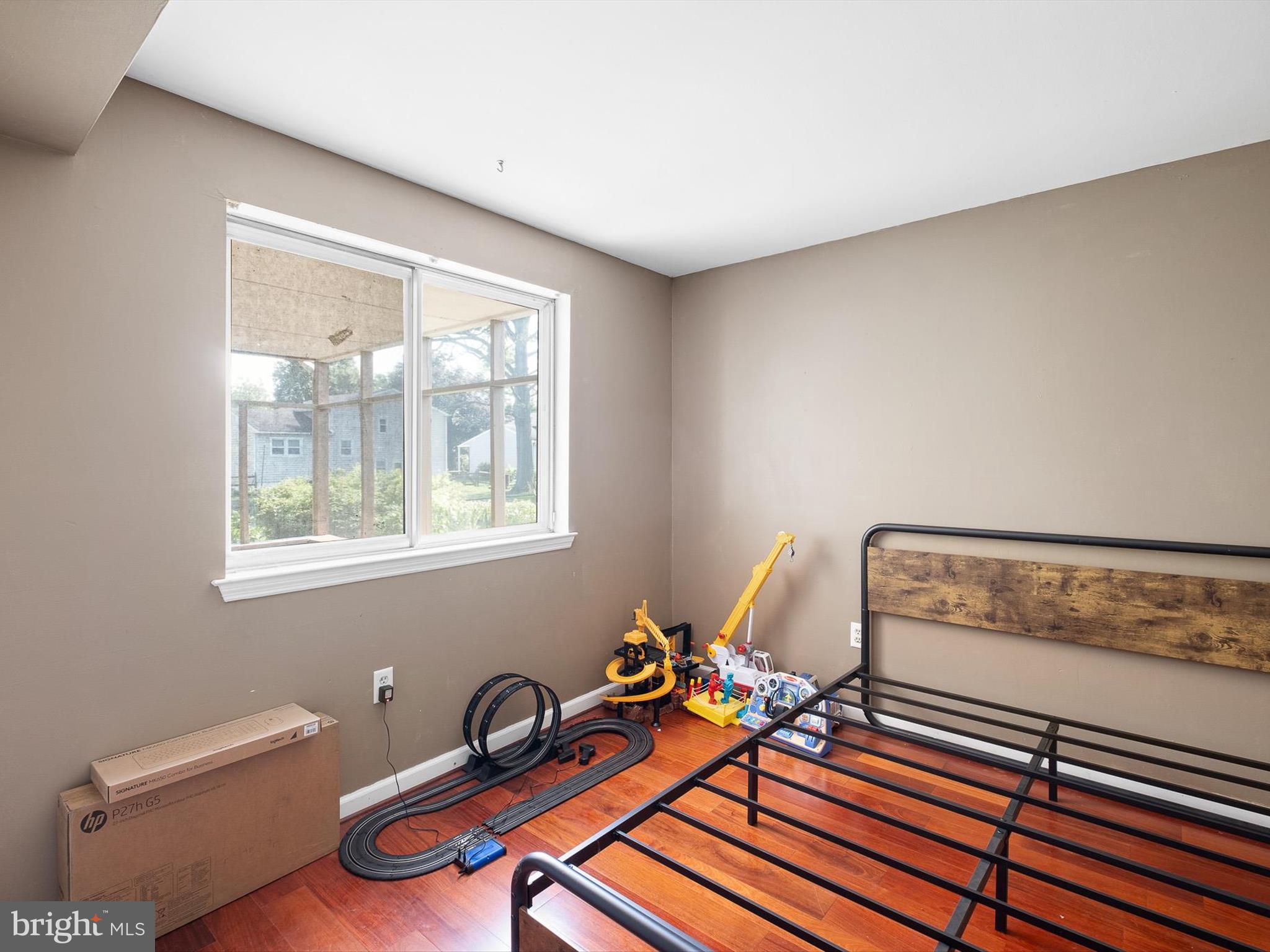 508 Garrick Road Hockessin, DE 19707 - Photo 15 of 25 a bedroom with furniture and a window