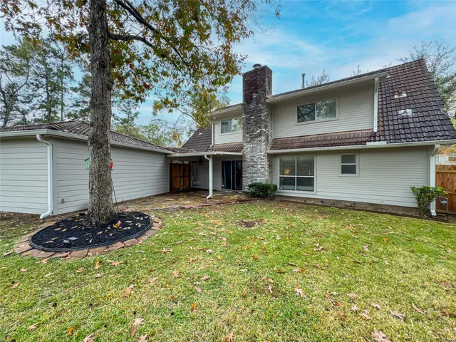 a view of a garden with a tree