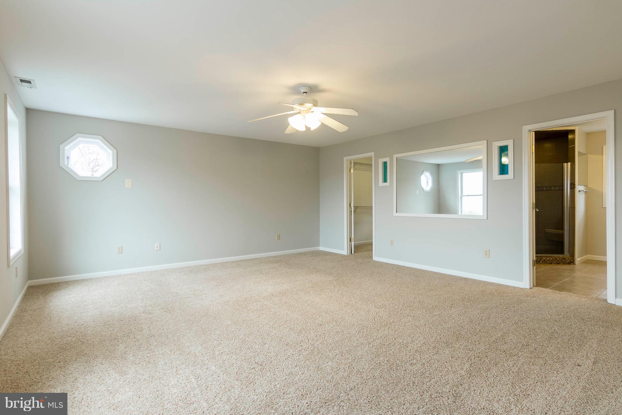 5901 Shady Spring Avenue Baltimore, MD 21237 - Photo 17 of 30 a view of an empty room with a window