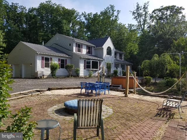 5901 Shady Spring Avenue Baltimore, MD 21237 - Photo 3 of 30 a view of a house with backyard porch and sitting area