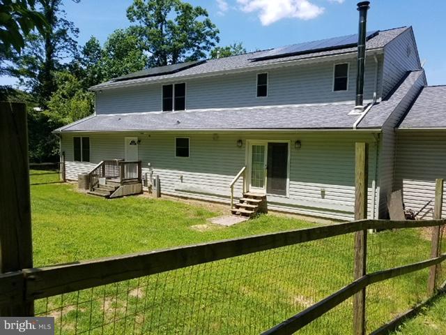5901 Shady Spring Avenue Baltimore, MD 21237 - Photo 27 of 30 a view of a house with backyard and porch