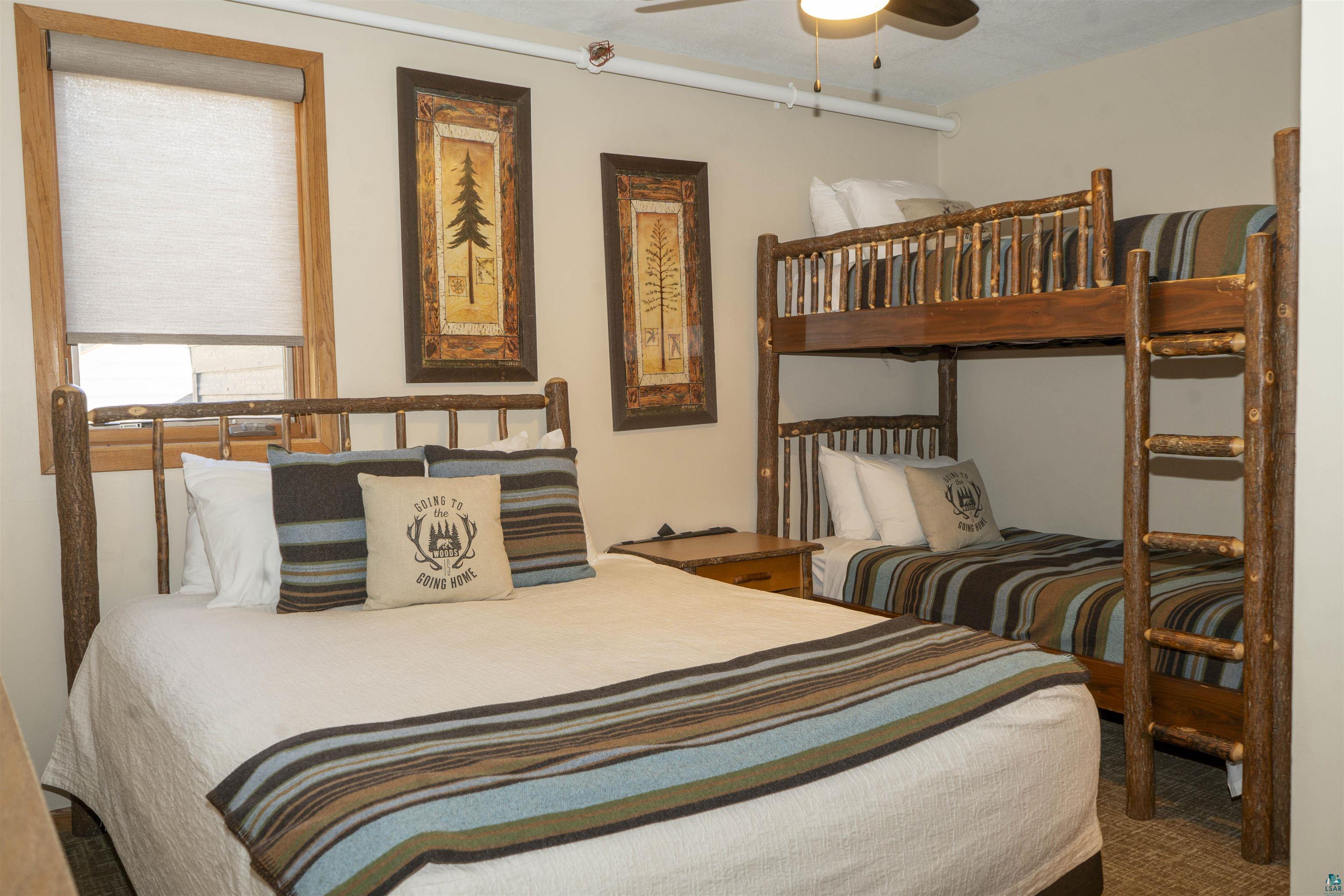 111 Bridge Run Lane, Unit 111 Lutsen, MN 55612 - Photo 15 of 48 Bedroom featuring ceiling fan