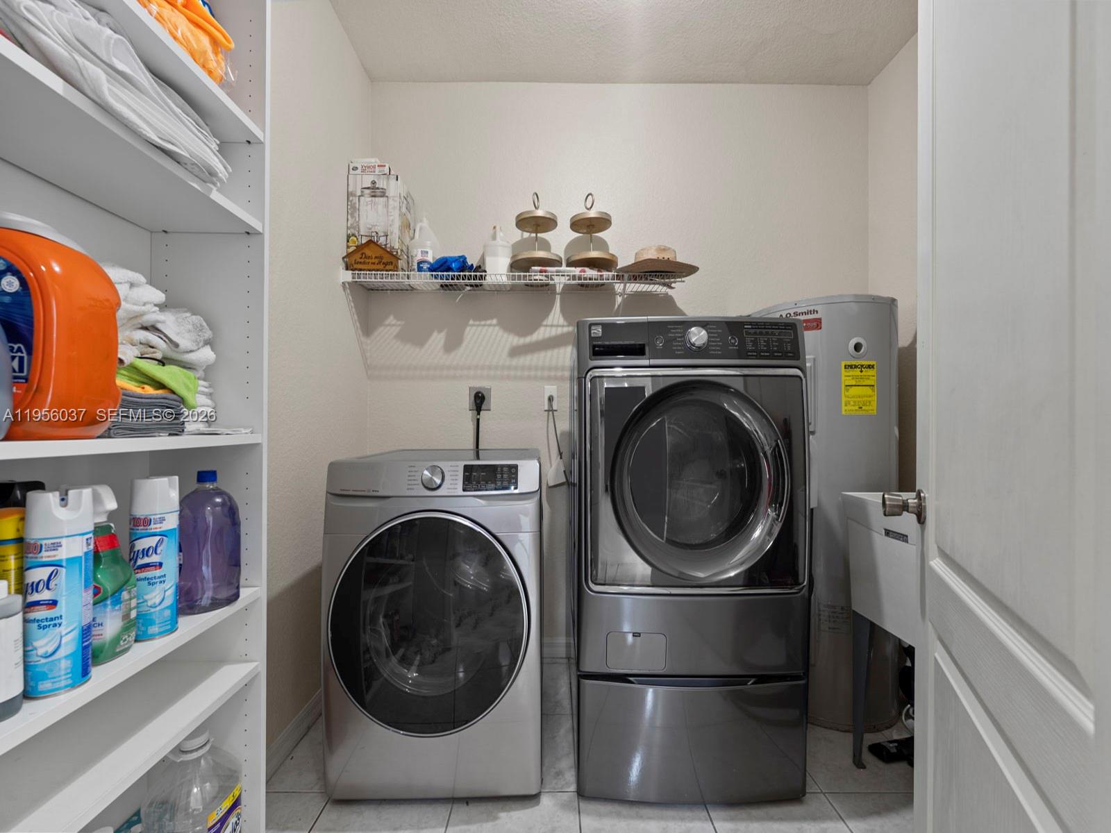 15383 Southwest 23rd Street Miami, FL 33185 - Photo 26 of 36 a utility room with dryer and washer