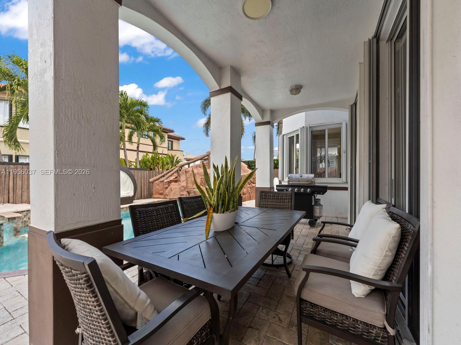 15383 Southwest 23rd Street Miami, FL 33185 - Photo 31 of 36 a view of a livingroom with furniture and a potted plant