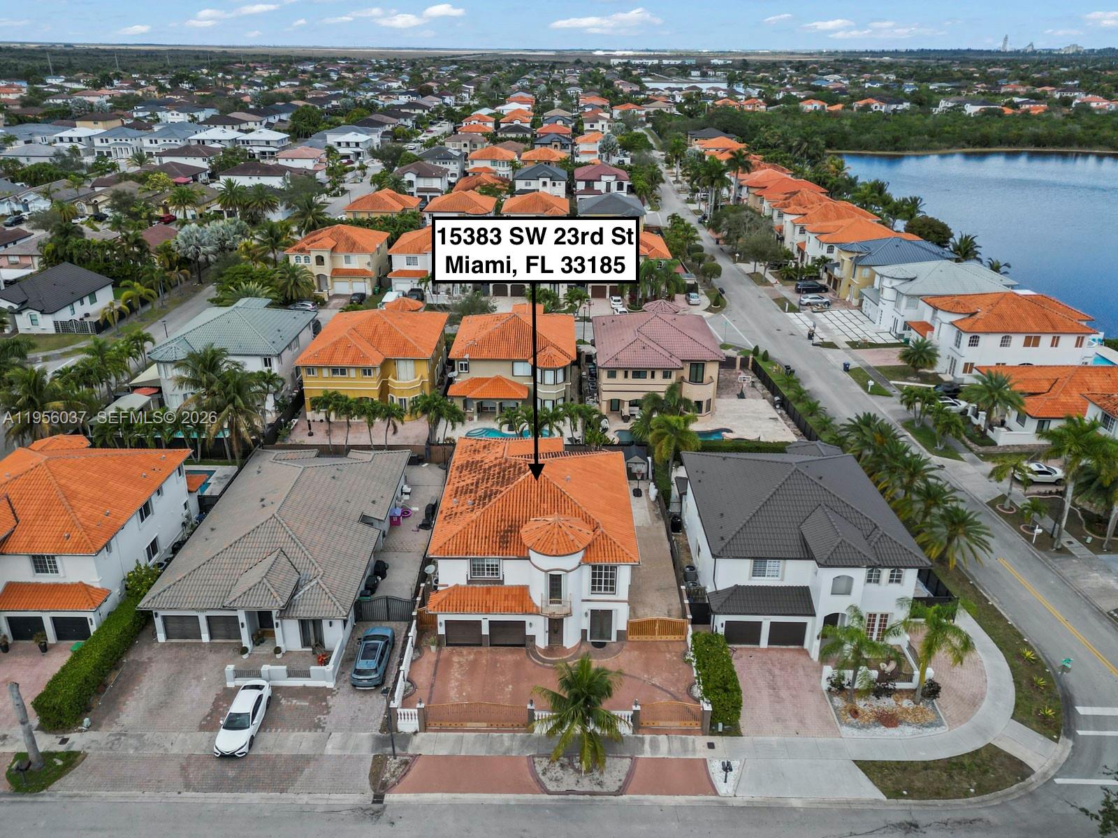 15383 Southwest 23rd Street Miami, FL 33185 - Photo 34 of 36 an aerial view of residential houses with outdoor space and lake view