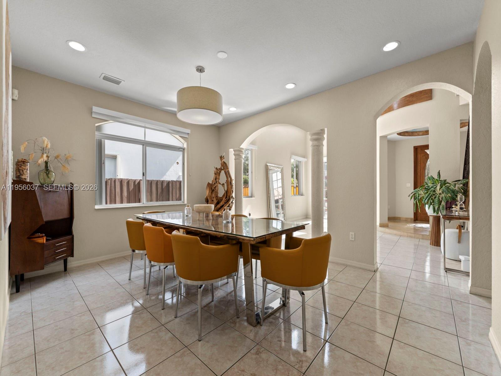 15383 Southwest 23rd Street Miami, FL 33185 - Photo 8 of 36 a view of a dining room with furniture