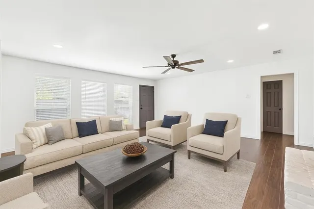 a living room with furniture and a couch