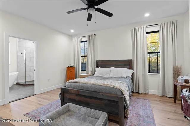 a bedroom with a bed and furniture