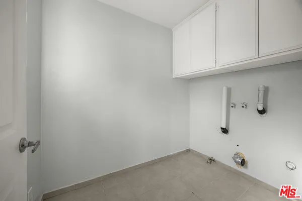 a view of a room with cabinets