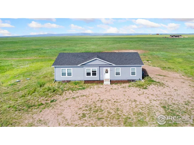 a aerial view of a house with a garden