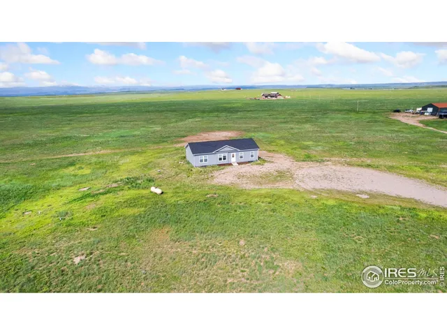 a black and white photo of a field