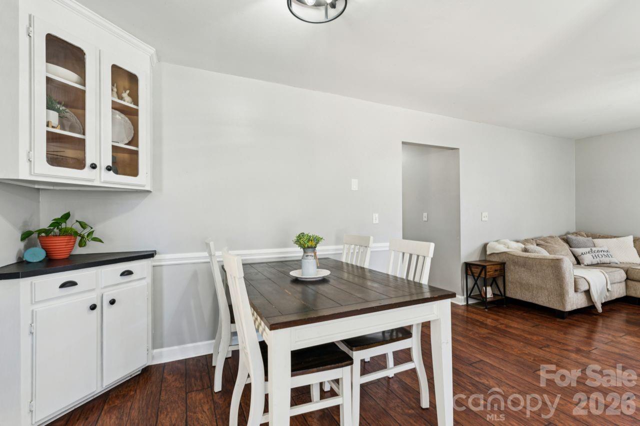 610 Eddleman Road Kannapolis, NC 28083 - Photo 11 of 34 a view of a dining room with furniture and wooden floor