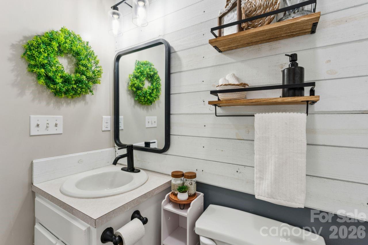 610 Eddleman Road Kannapolis, NC 28083 - Photo 17 of 34 a bathroom with a sink and a toilet