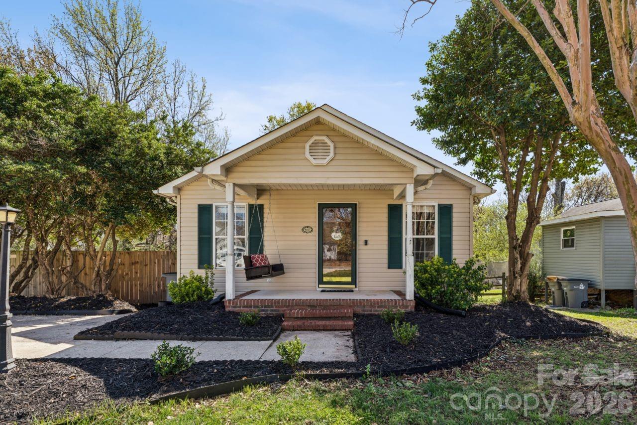 610 Eddleman Road Kannapolis, NC 28083 - Photo 2 of 34 a front view of a house with garden