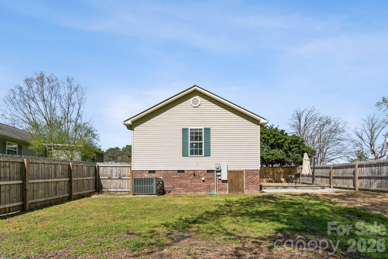 610 Eddleman Road Kannapolis, NC 28083 - Photo 33 of 34 a view of a house with a yard and sitting area