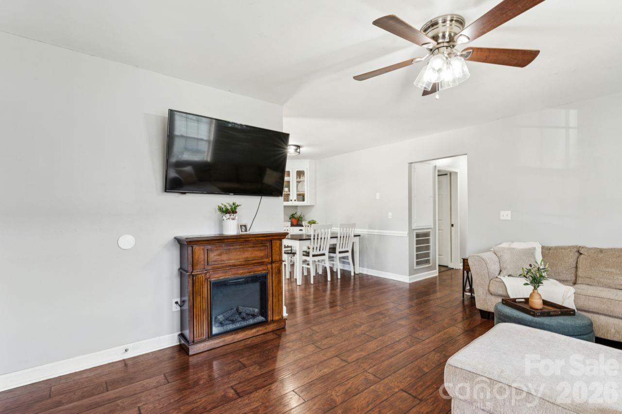 610 Eddleman Road Kannapolis, NC 28083 - Photo 6 of 34 a living room with furniture and a flat screen tv