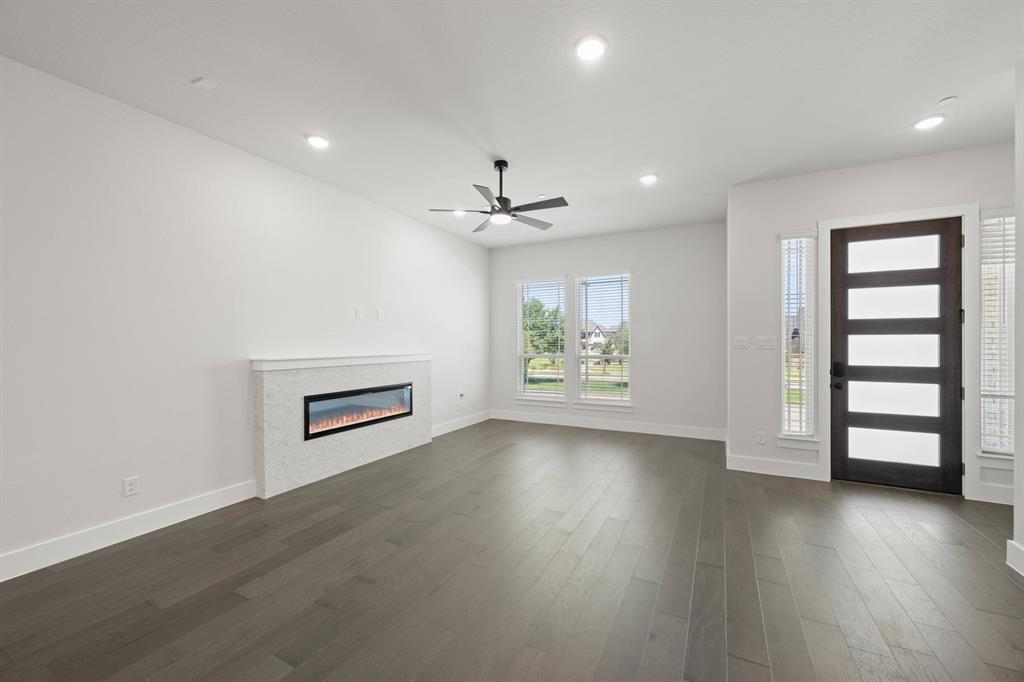 12735 Rutland Drive Dallas, TX 75234 - Photo 9 of 29 7_1848 Wittington- Living Room-2