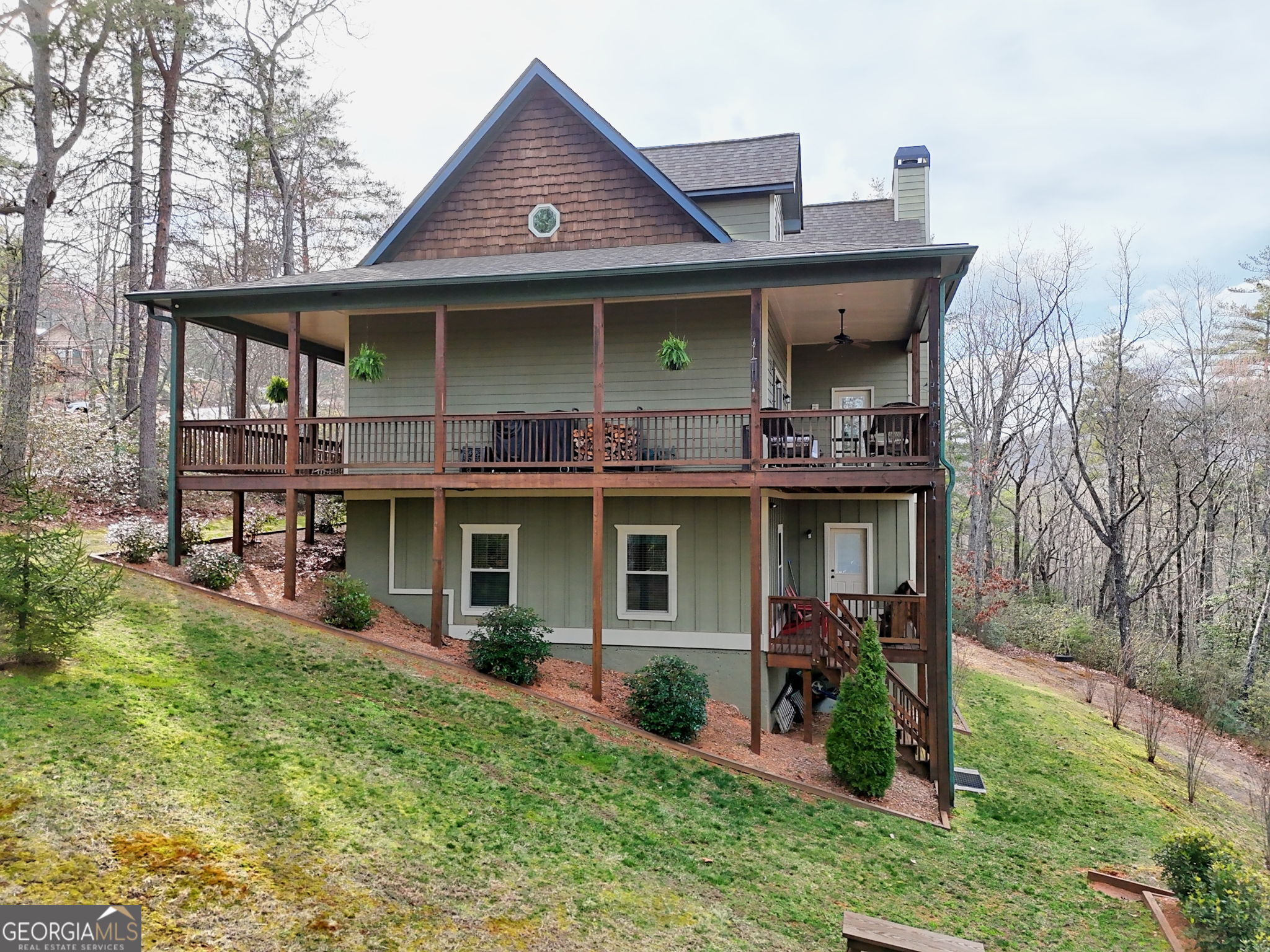 421 Hickory Nut Mountain Road Tallulah Falls, GA 30573 - Photo 103 of 117 a front view of a house with garden
