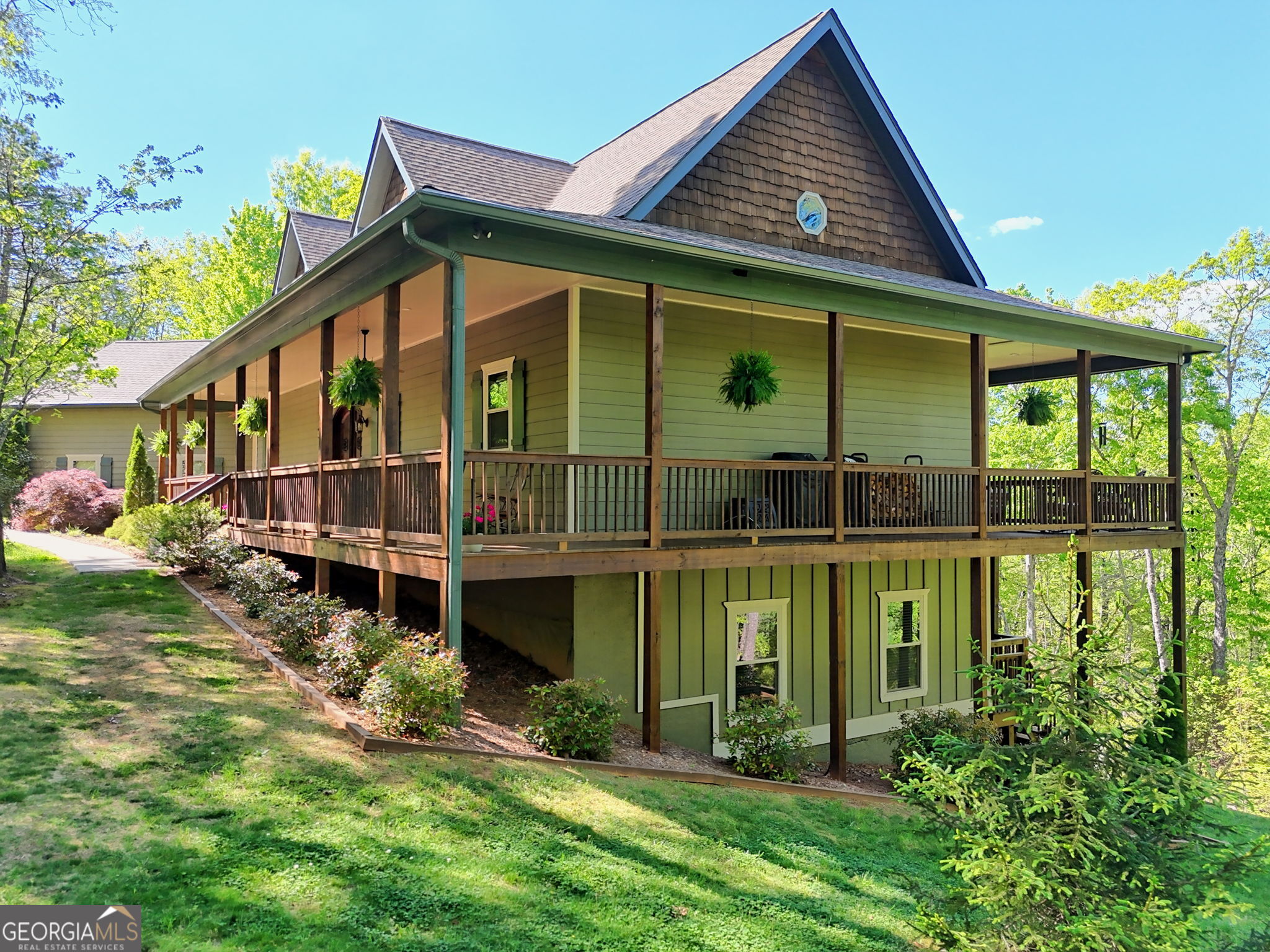 421 Hickory Nut Mountain Road Tallulah Falls, GA 30573 - Photo 16 of 117 a view of a house with a yard balcony and balcony