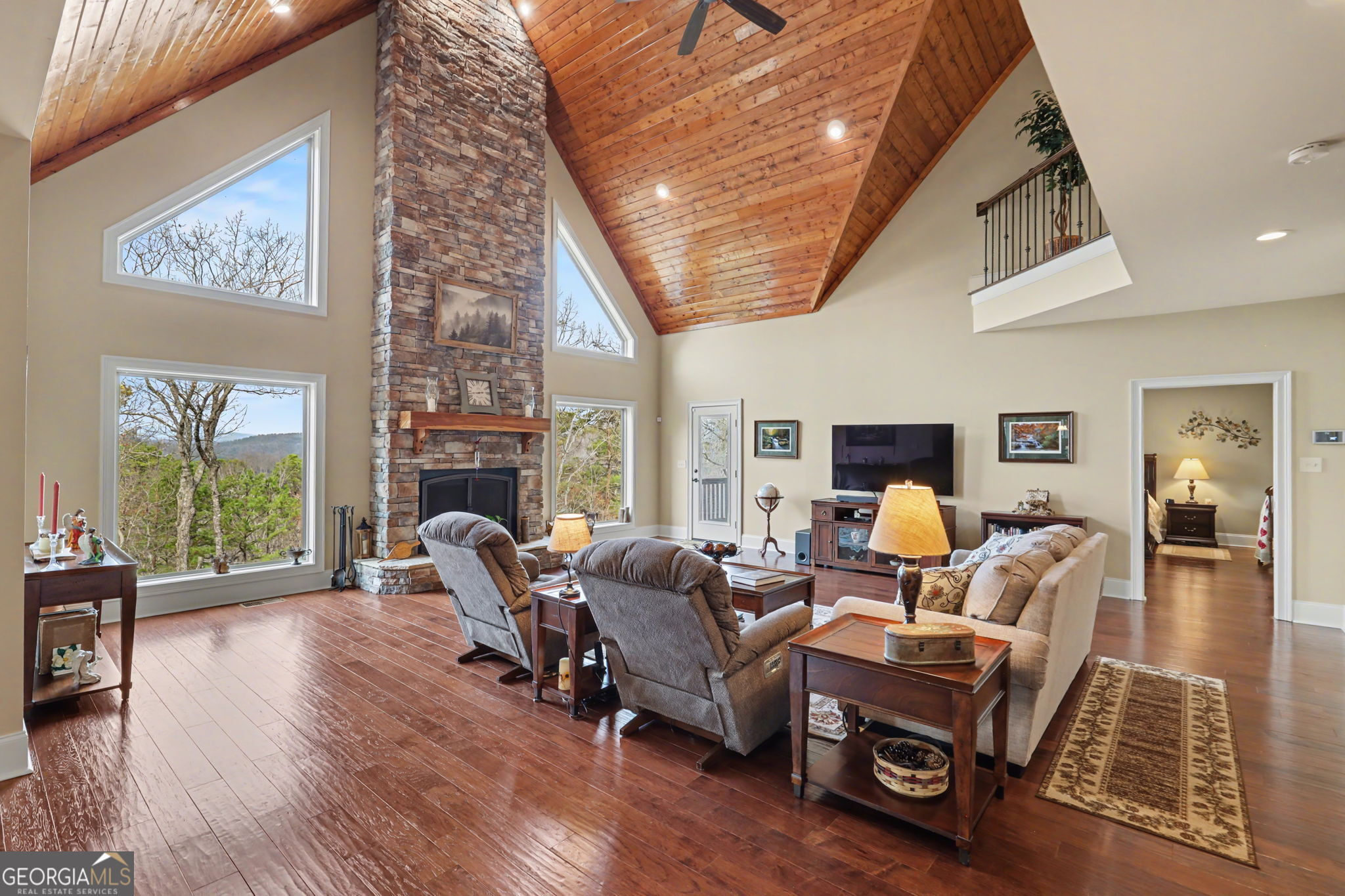 421 Hickory Nut Mountain Road Tallulah Falls, GA 30573 - Photo 19 of 117 a living room with furniture or fireplace and wooden floor