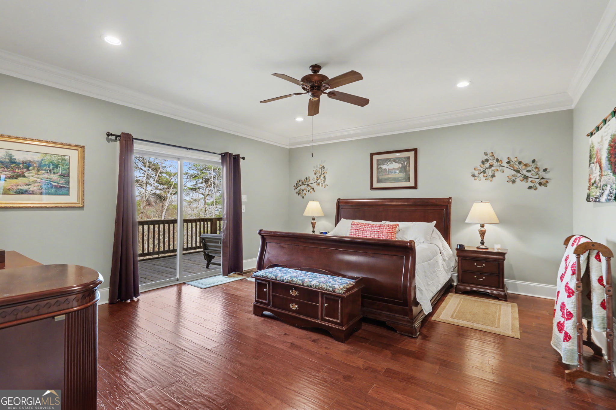 421 Hickory Nut Mountain Road Tallulah Falls, GA 30573 - Photo 31 of 117 a spacious bedroom with a bed and wooden floor