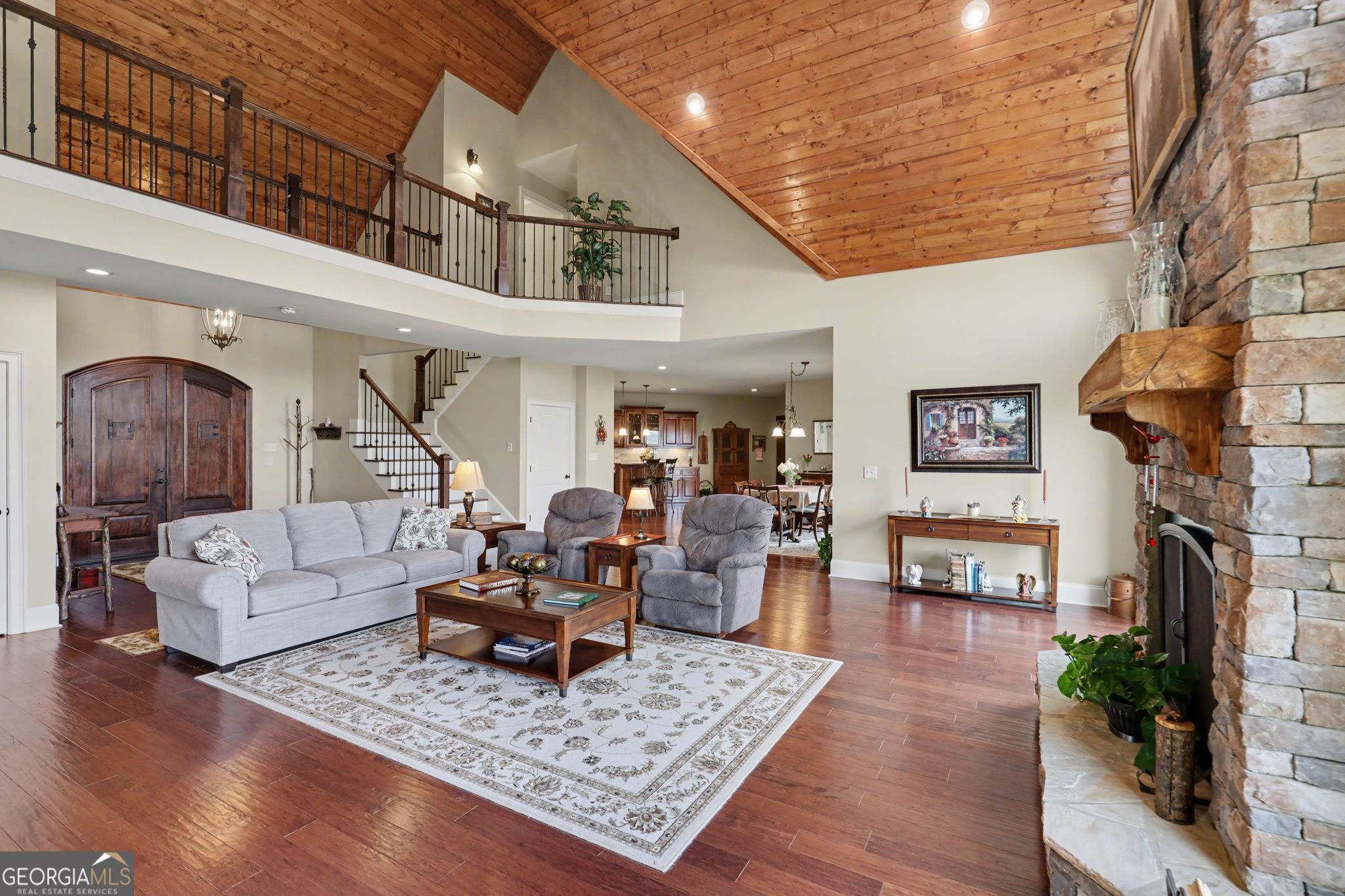 421 Hickory Nut Mountain Road Tallulah Falls, GA 30573 - Photo 38 of 117 a living room with furniture and a fireplace