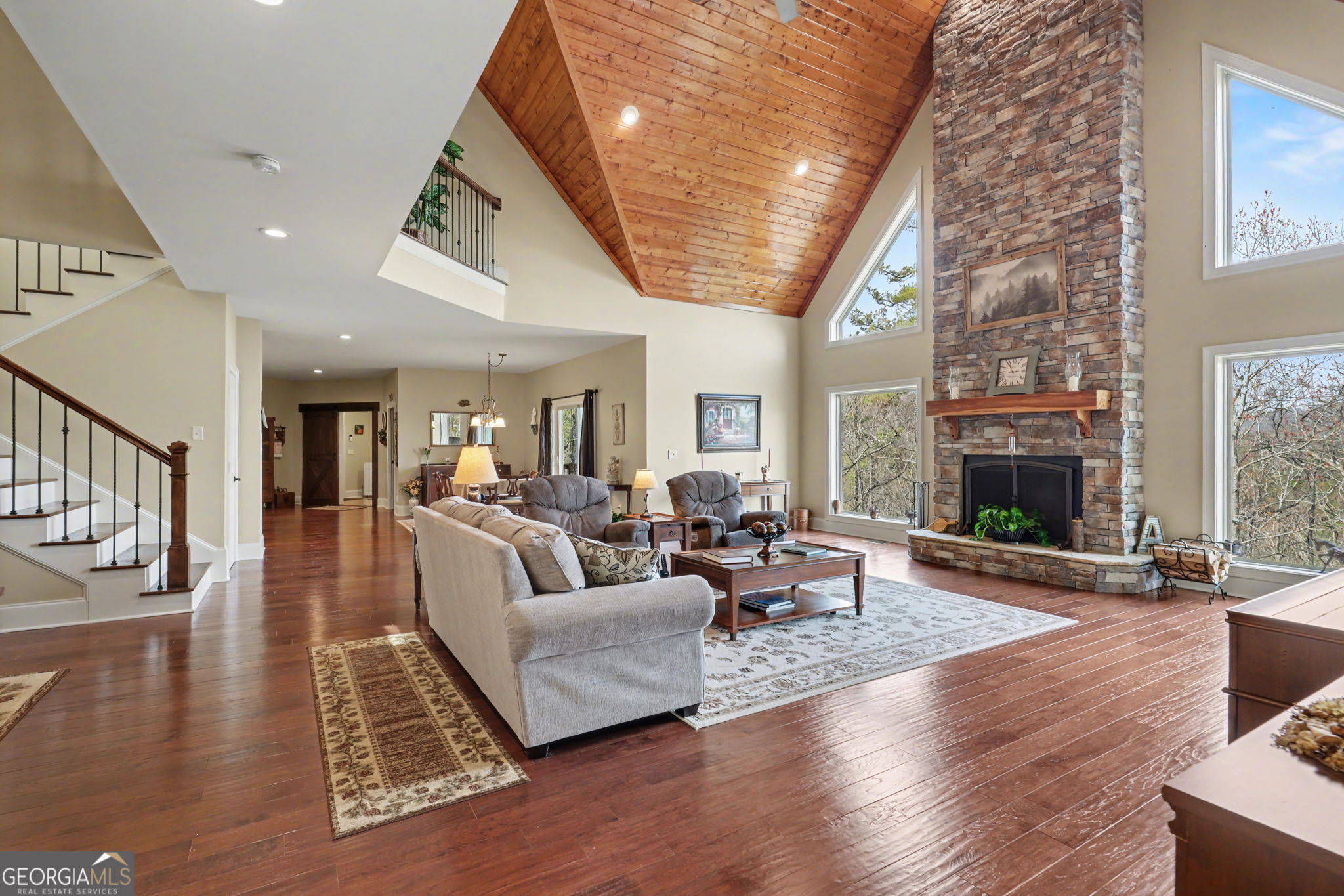 421 Hickory Nut Mountain Road Tallulah Falls, GA 30573 - Photo 39 of 117 a living room with furniture or fireplace and a wooden floor