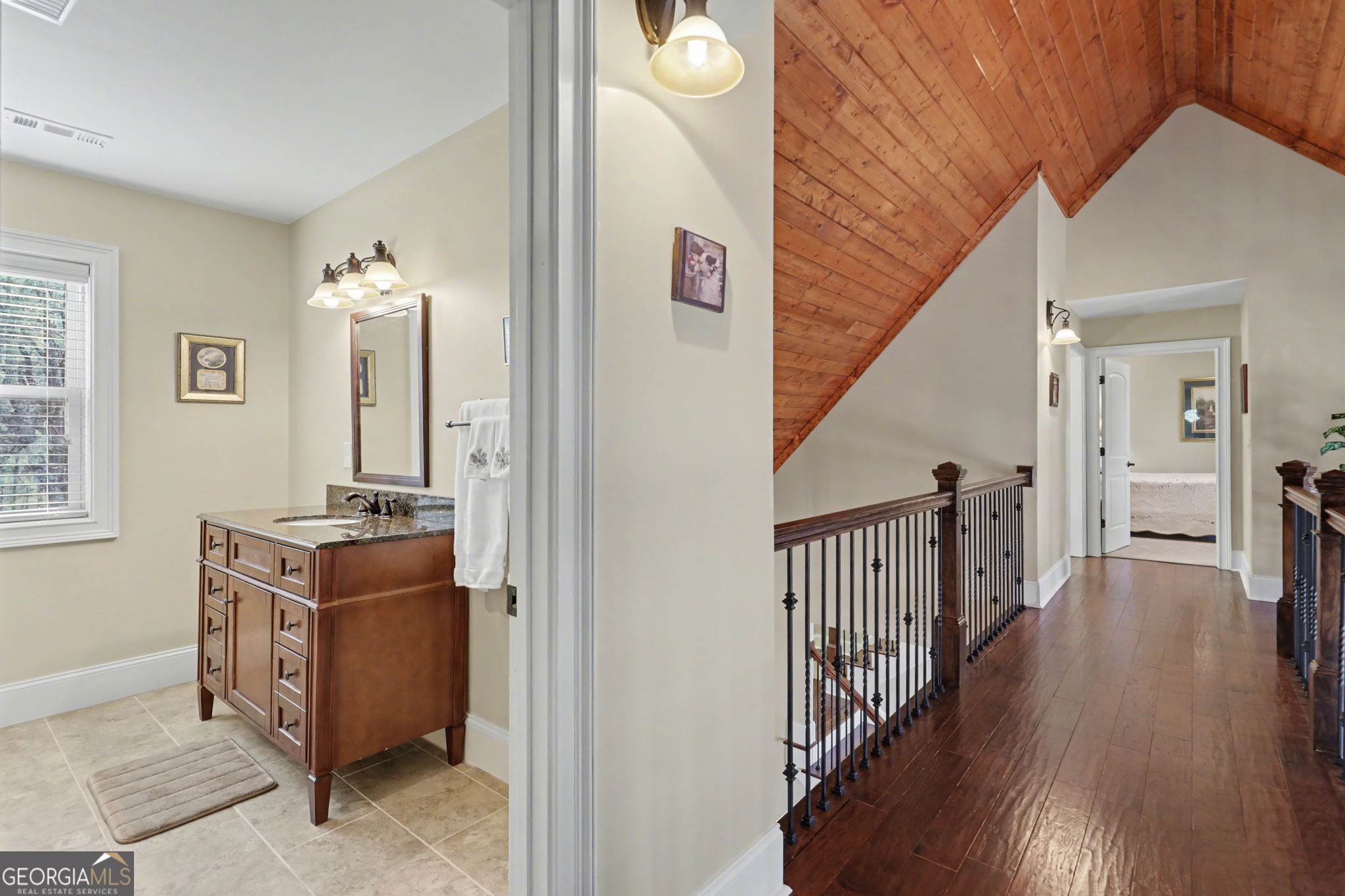 421 Hickory Nut Mountain Road Tallulah Falls, GA 30573 - Photo 47 of 117 a view of a hallway with wooden floor and staircase