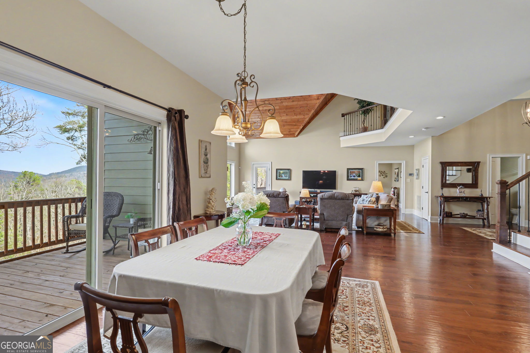 421 Hickory Nut Mountain Road Tallulah Falls, GA 30573 - Photo 64 of 117 a view of a dining room with furniture window and wooden floor