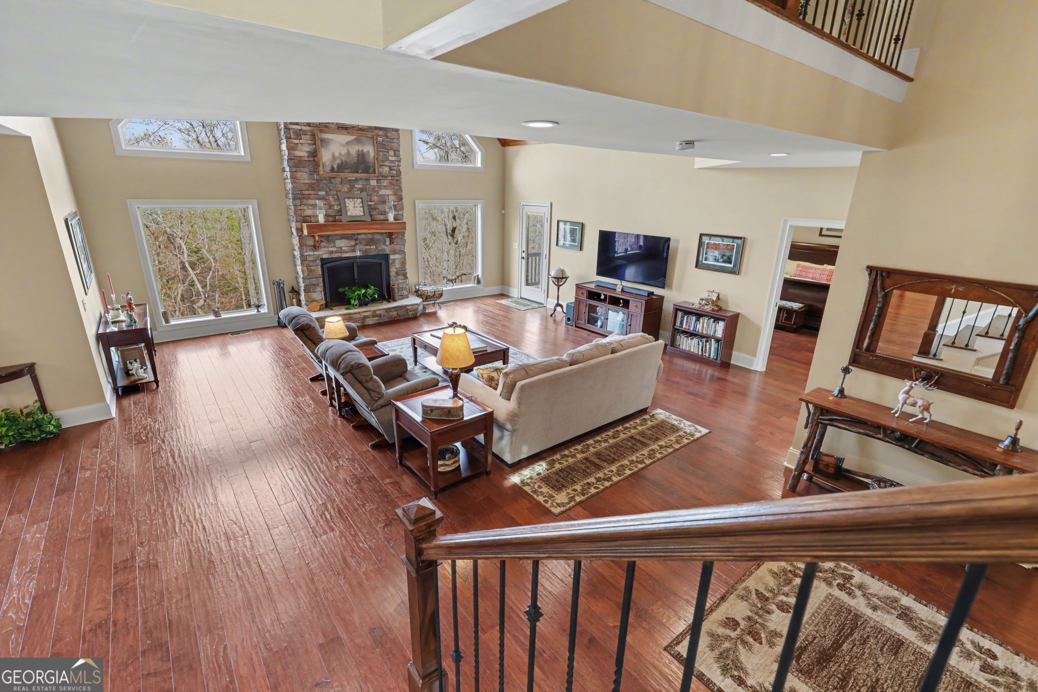 421 Hickory Nut Mountain Road Tallulah Falls, GA 30573 - Photo 87 of 117 a living room with furniture and a flat screen tv