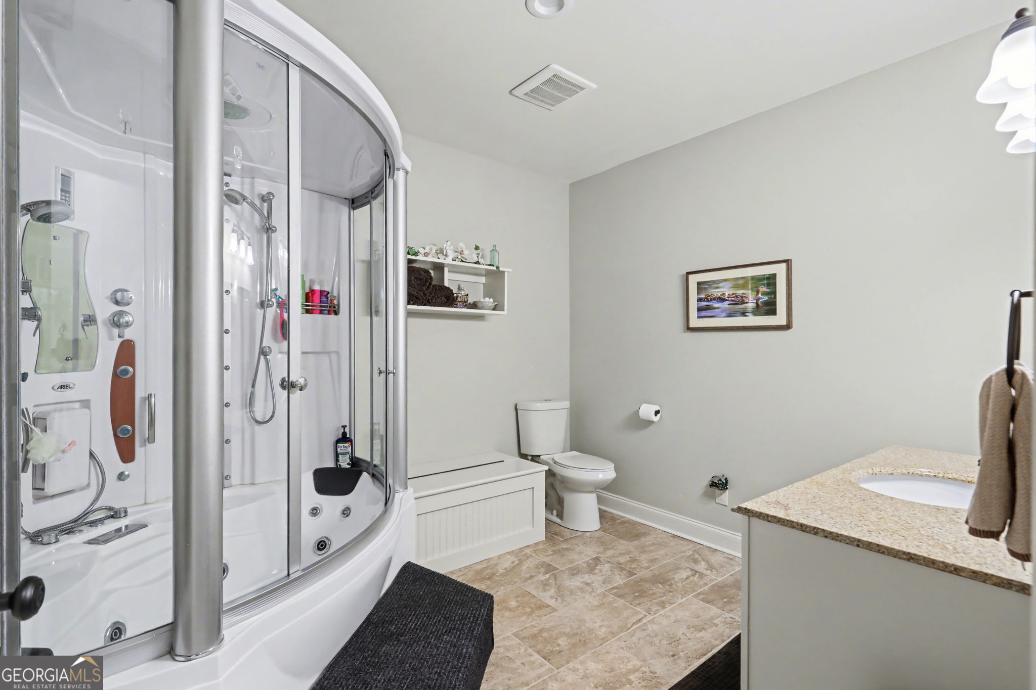 421 Hickory Nut Mountain Road Tallulah Falls, GA 30573 - Photo 95 of 117 a bathroom with a toilet sink and shower