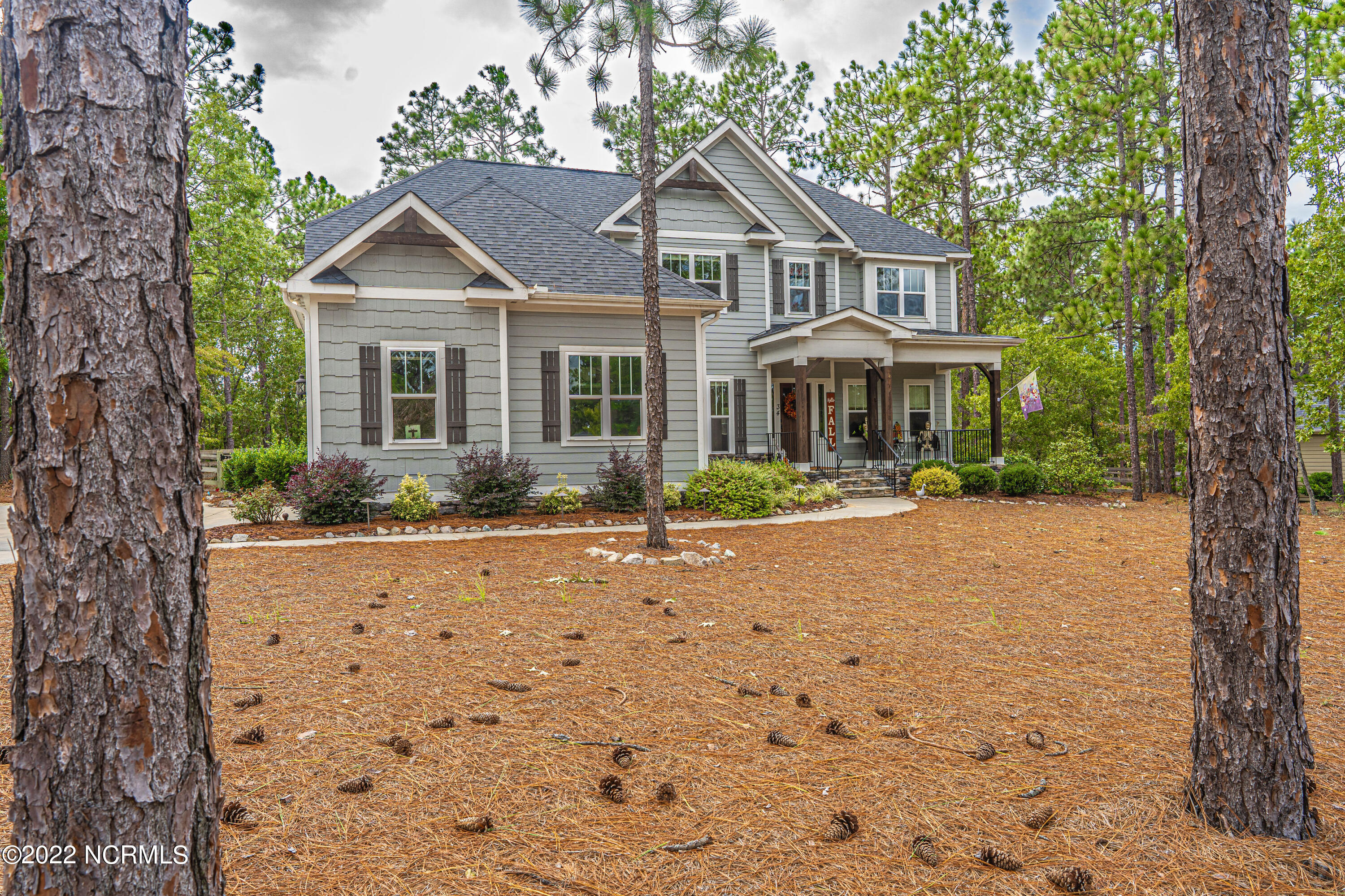 34 Cardinal Drive Whispering Pines, NC 28327 - Photo 2 of 73 front of home