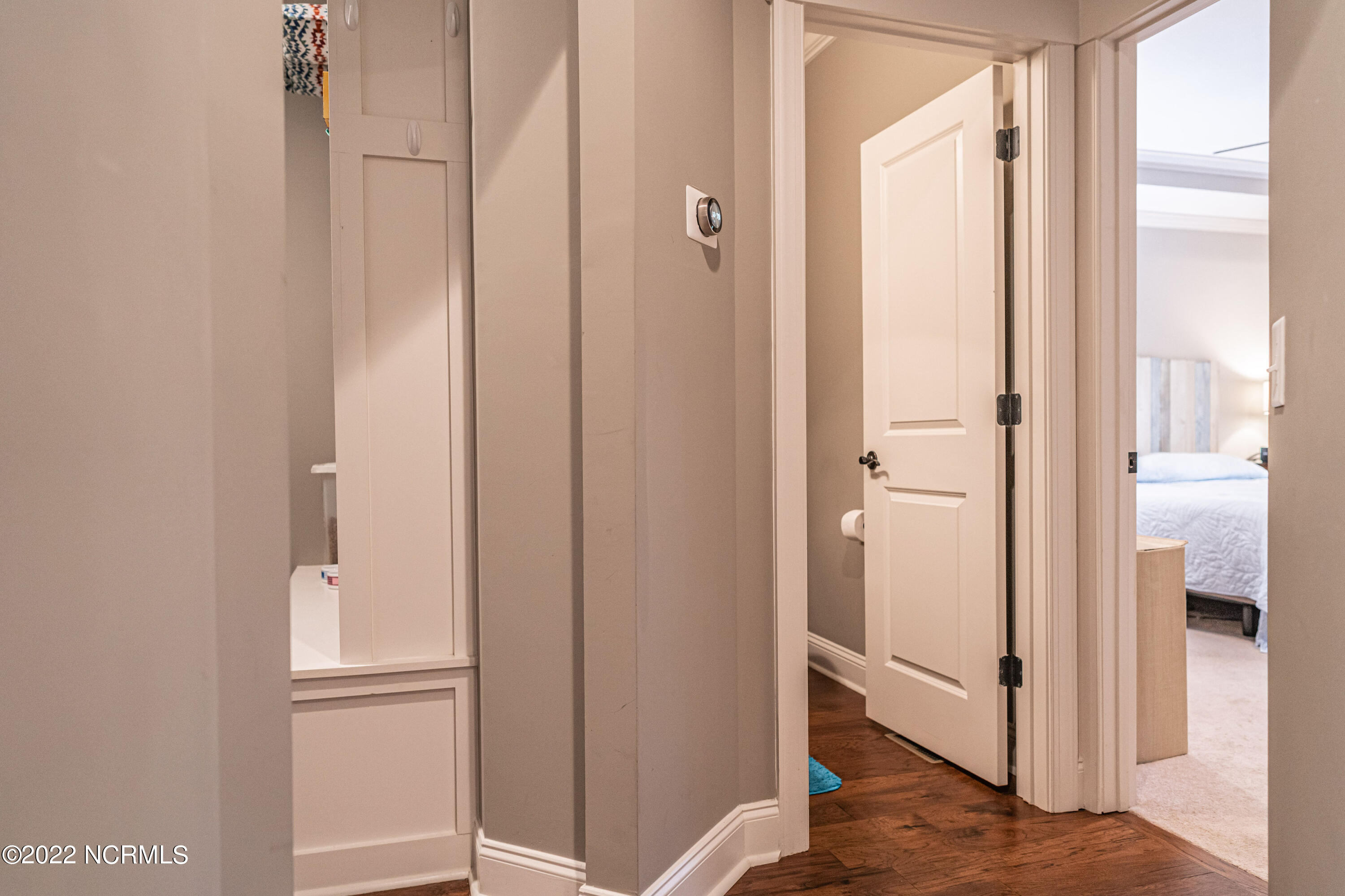 34 Cardinal Drive Whispering Pines, NC 28327 - Photo 27 of 73 hallway to master suite
