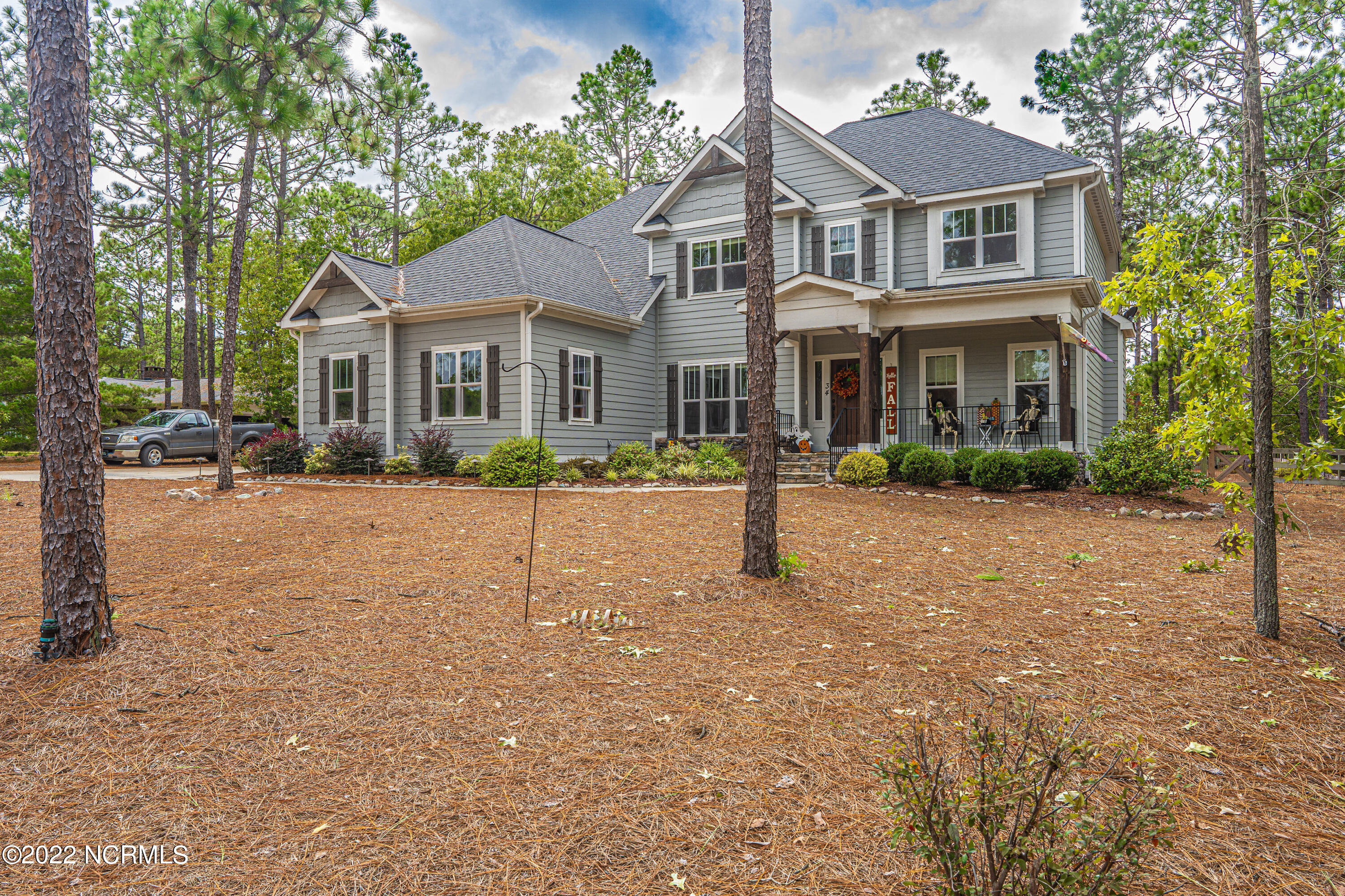 34 Cardinal Drive Whispering Pines, NC 28327 - Photo 3 of 73 front of home