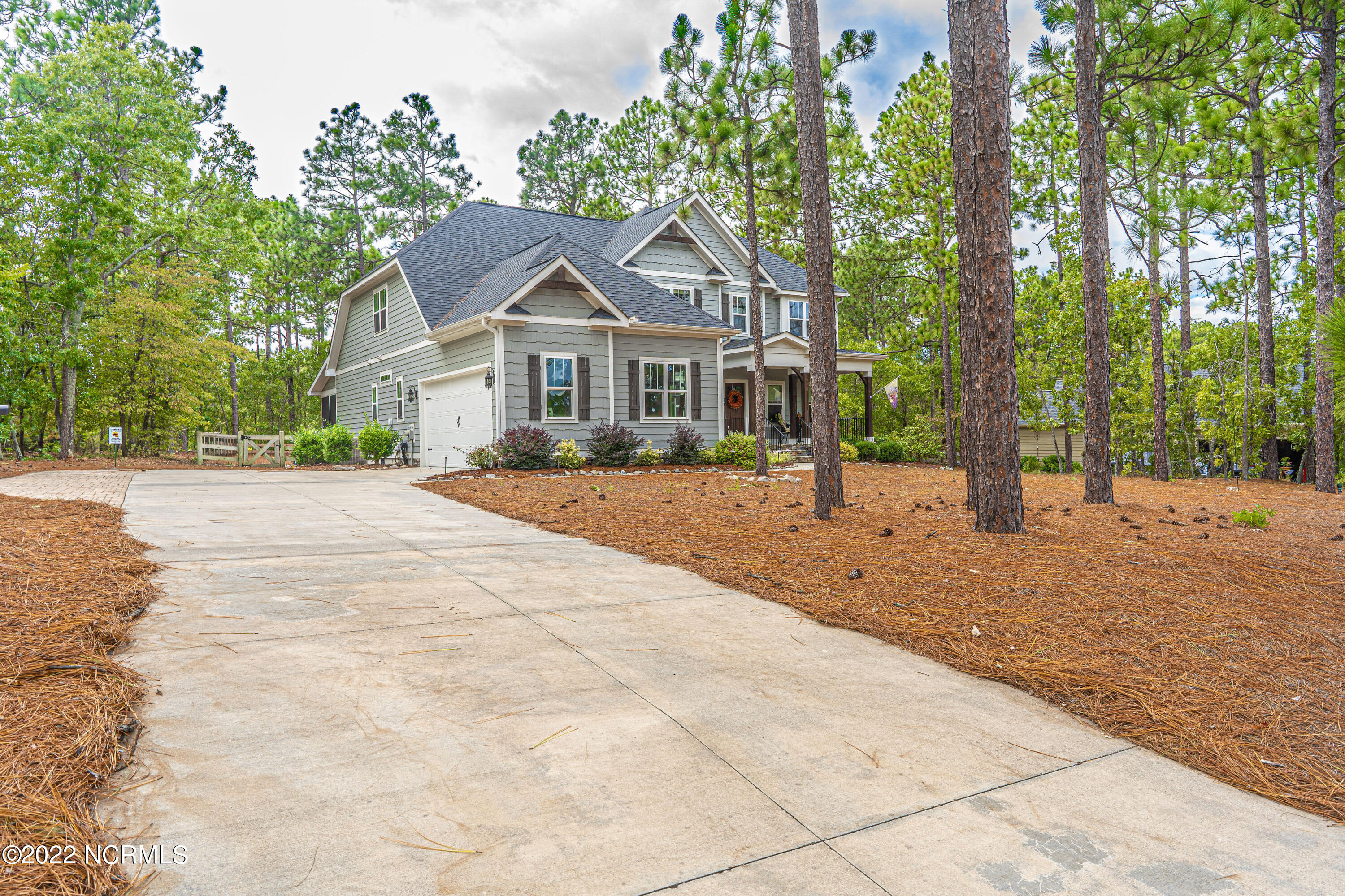34 Cardinal Drive Whispering Pines, NC 28327 - Photo 5 of 73 front drive way
