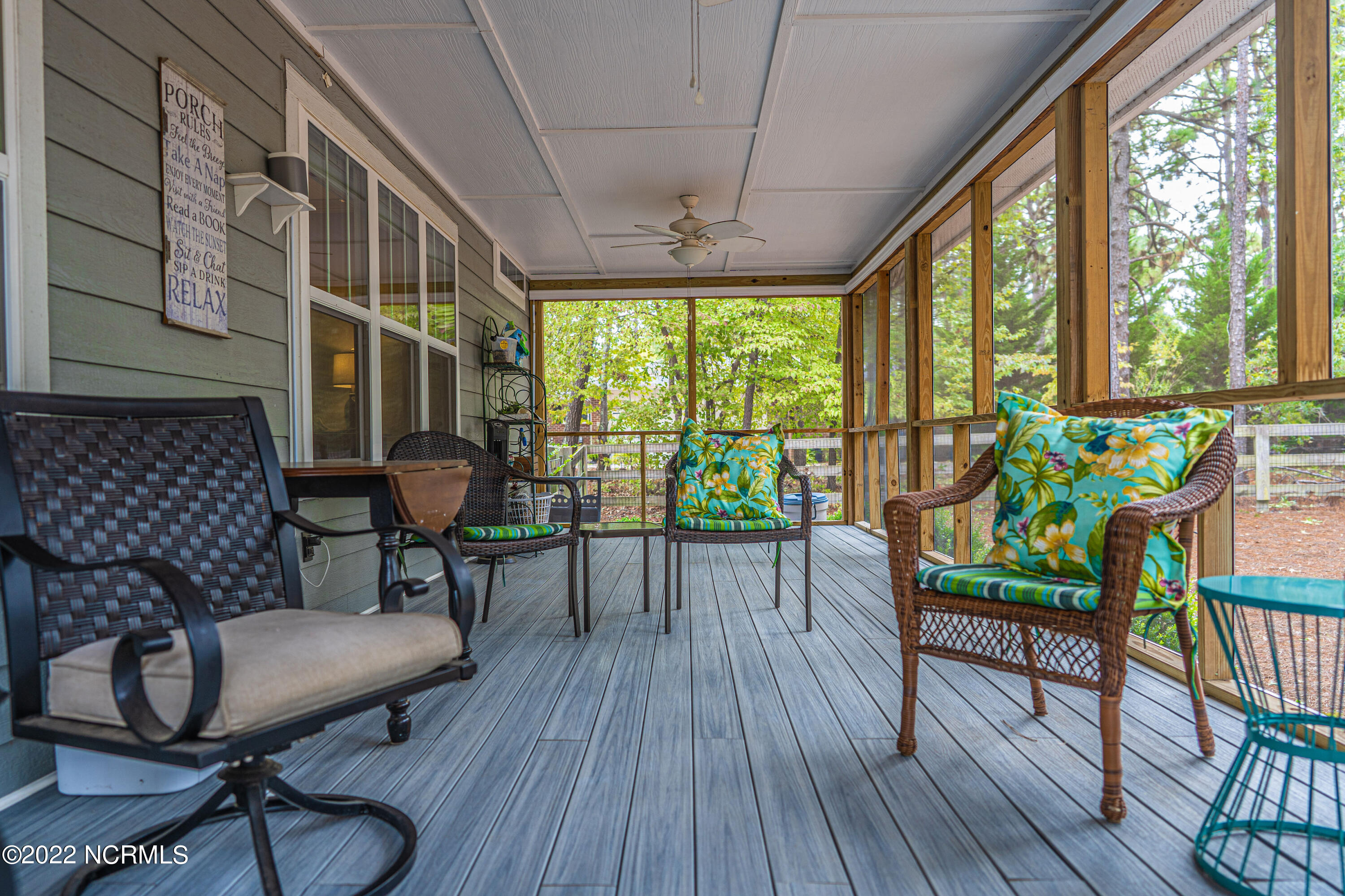 34 Cardinal Drive Whispering Pines, NC 28327 - Photo 59 of 73 Screened back porch