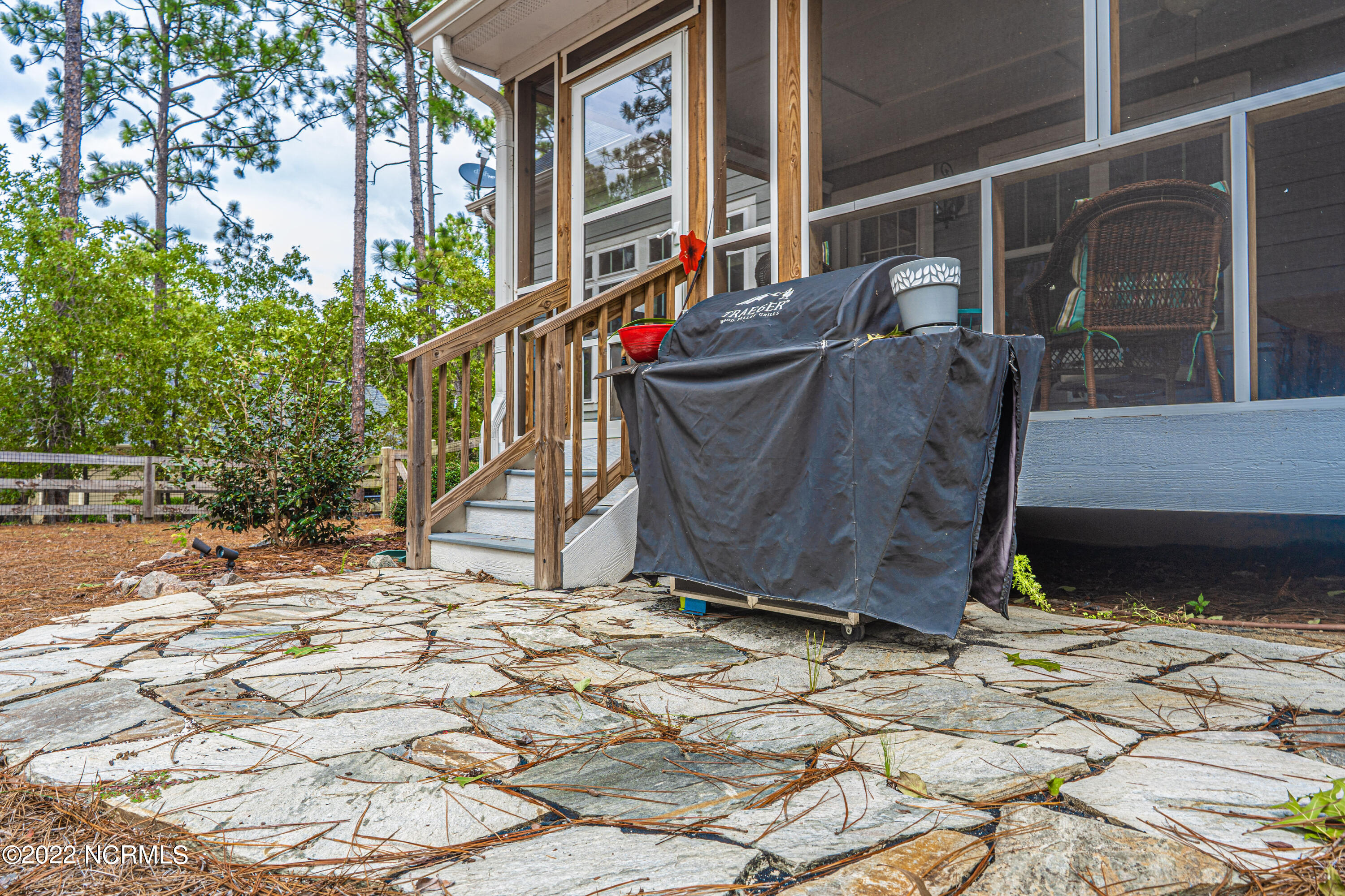 34 Cardinal Drive Whispering Pines, NC 28327 - Photo 60 of 73 back patio
