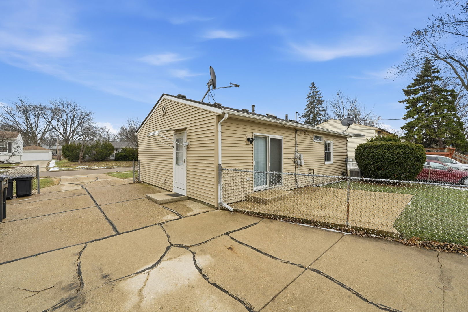 210 Willow Road Streamwood, IL 60107 - Photo 18 of 26 a view of a house with a backyard