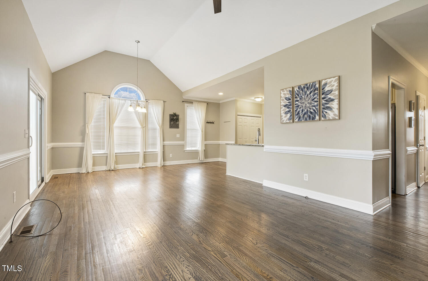 124 D'Ango Circle Angier, NC 27501 - Photo 13 of 42 a view of an empty room with wooden floor and a window