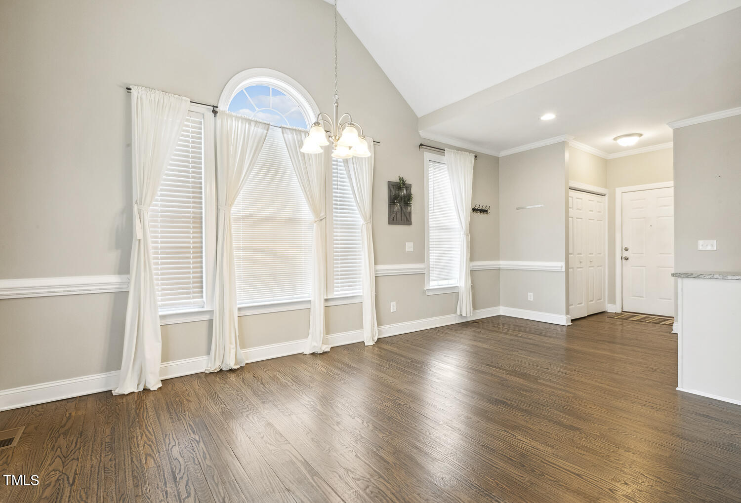 124 D'Ango Circle Angier, NC 27501 - Photo 16 of 42 wooden floor in an empty room with a window